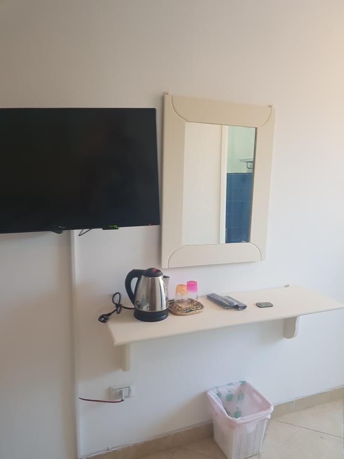 Lilly Rooms And Studio Hurghada Bagian luar foto